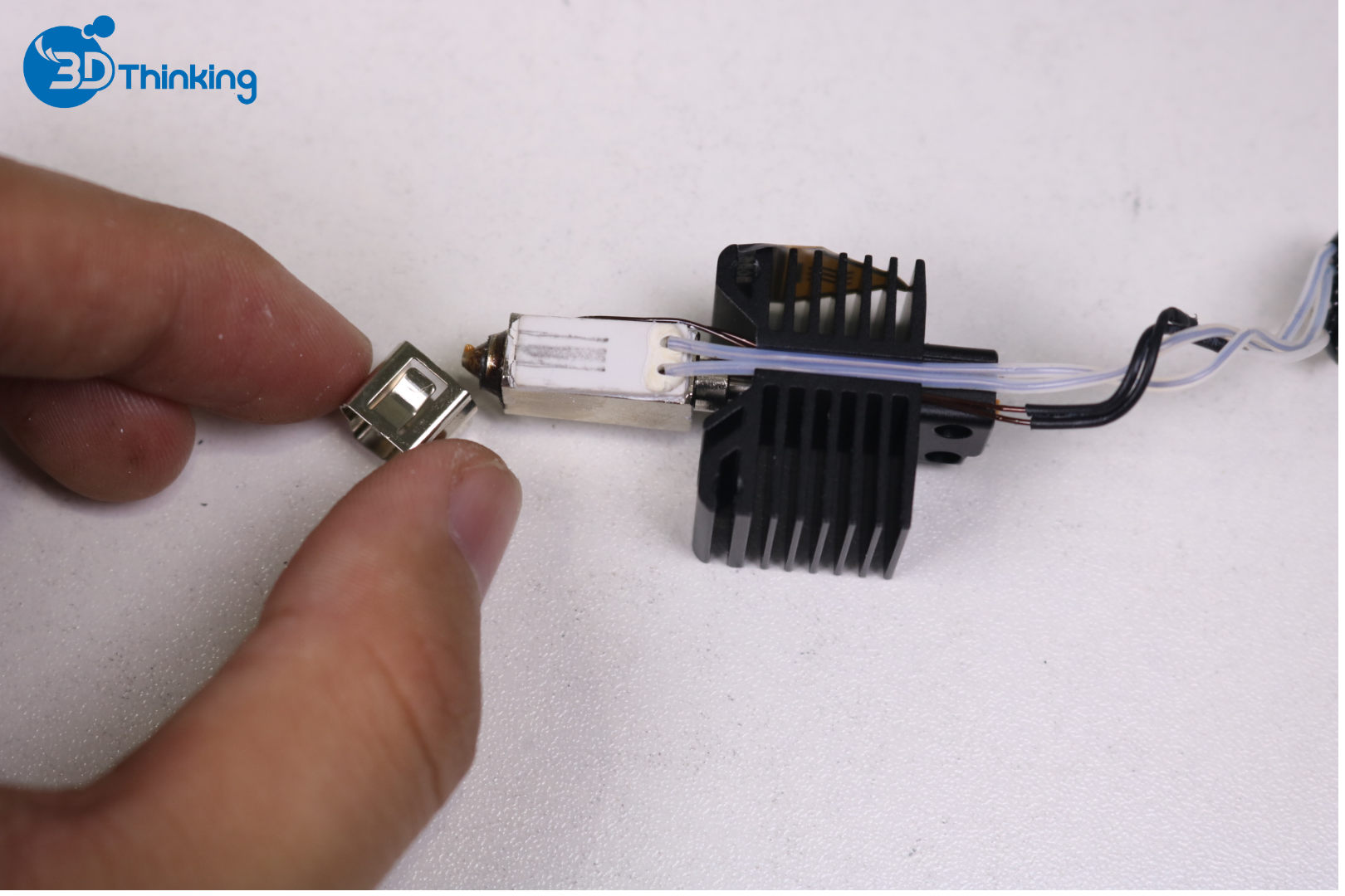 thay thế cụm đầu đùn nóng